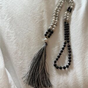 Sophisticated Black and White Necklace with Tassel